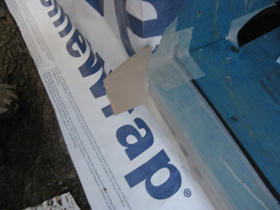 Window sill pan using flashing tape with custom back dam